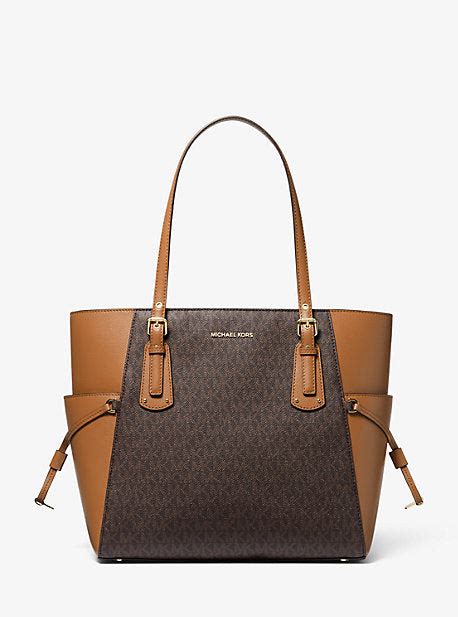 michael michael kors voyager small logo tote bag|michael kors saffiano tote large.